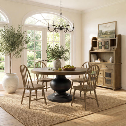Dining table with 4 spindle-back chairs in a warm wood-tone finish