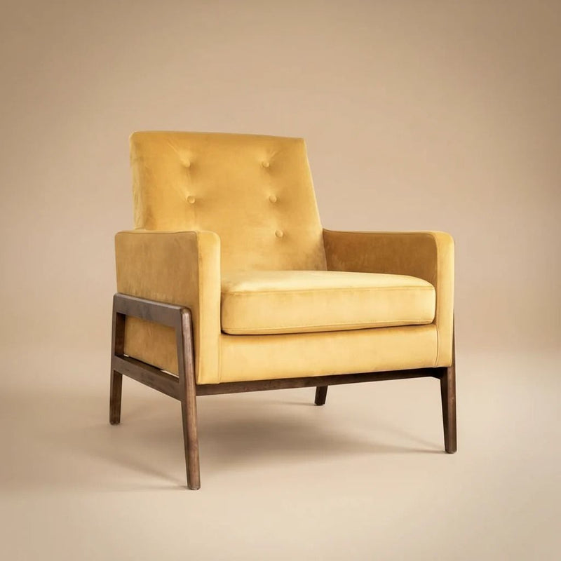 Yellow upholstered lounge chair with tufted back, padded seat, and solid wood frame.