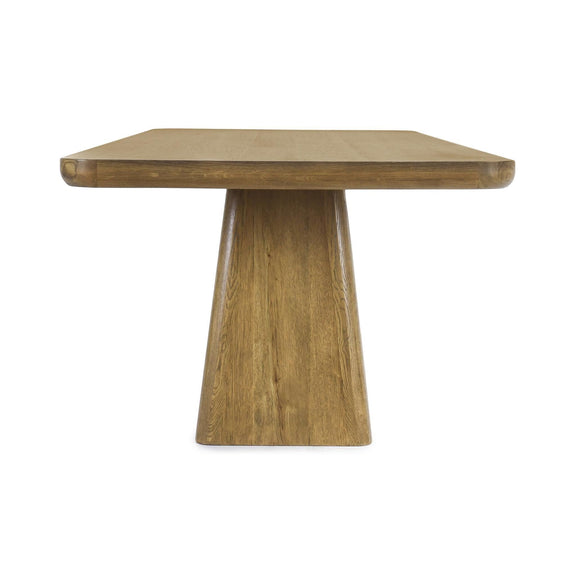 Light brown wood dining table with round-corner rectangular top and single pedestal