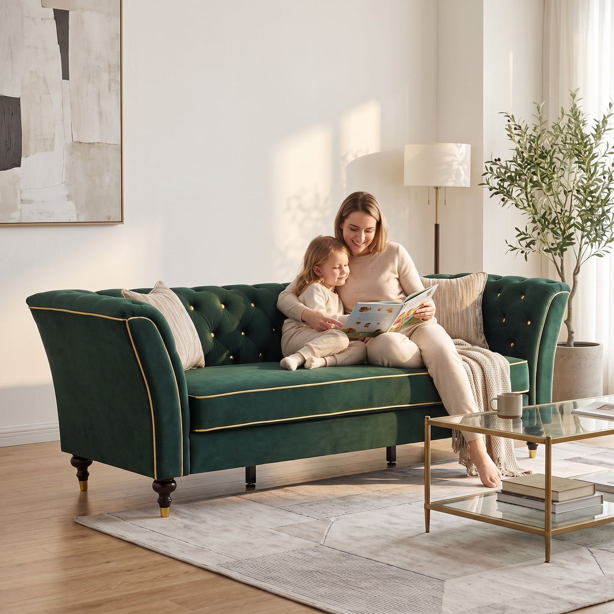 Deep green tufted three-seat sofa with gold trim and two pillows, shown in use