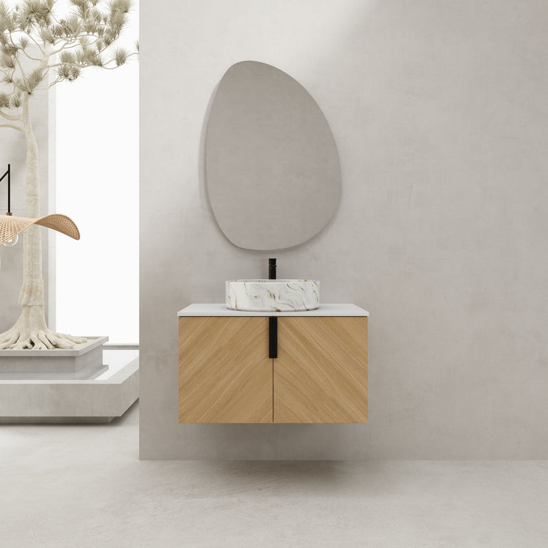 Wall-mounted bathroom vanity with art sink, light wood cabinet and white marbled round vessel sink