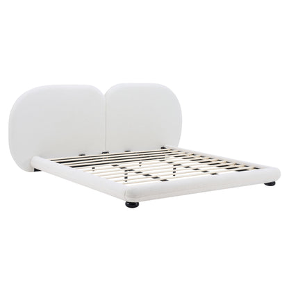 White upholstered platform bed with split headboard, slatted base and black feet