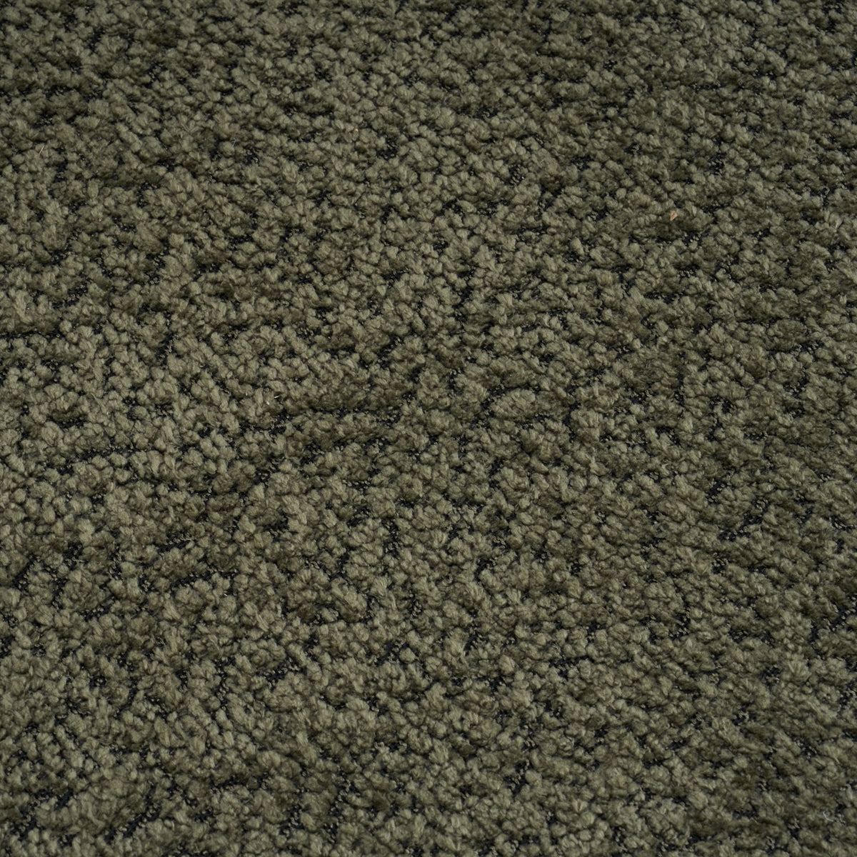 Dark green loveseat upholstery fabric close-up, dense textured weave