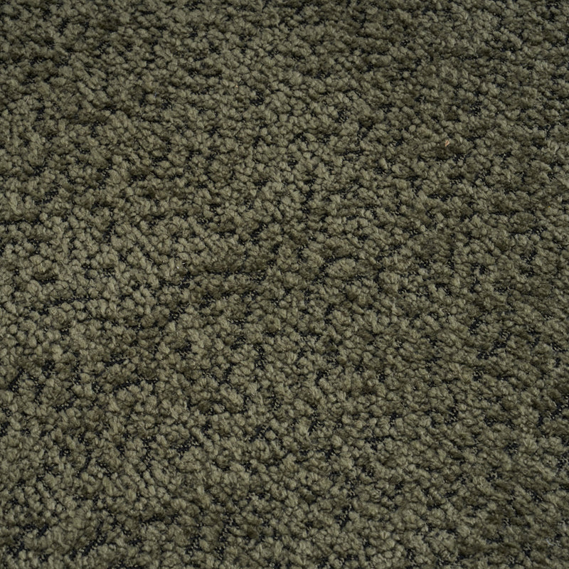 Dark green loveseat upholstery fabric close-up, dense textured weave