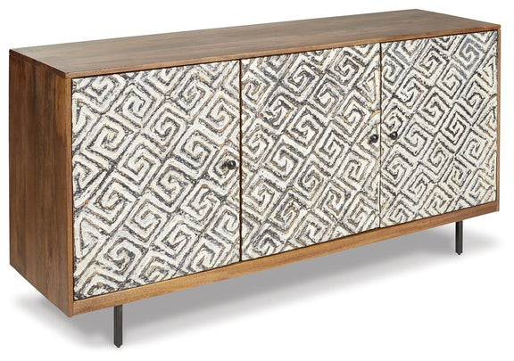 Accent cabinet with three geometric doors, white fabric-look panels with black trim, tapered legs.