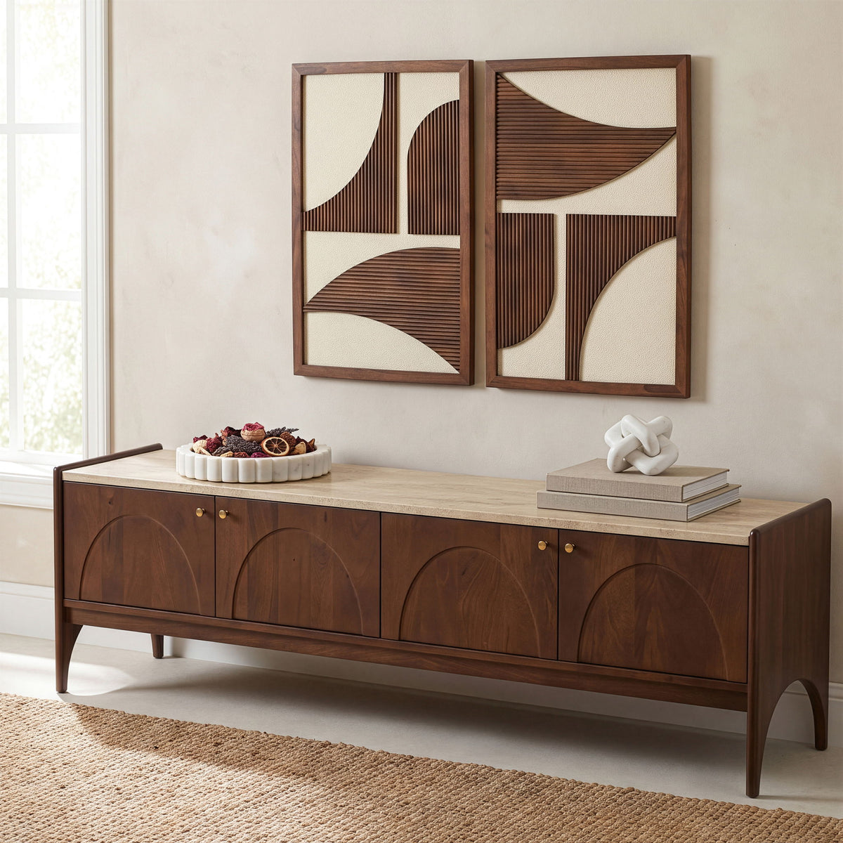 Mango wood media console with beige marble top, carved fronts, and brass knobs