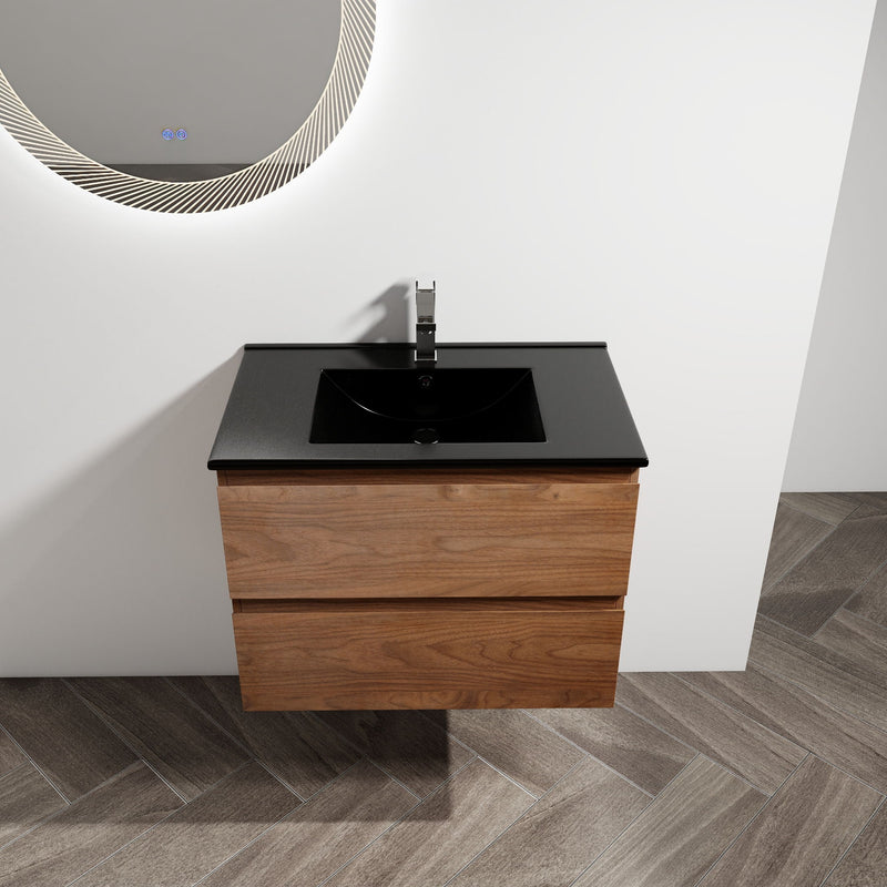 Wall-mounted bathroom vanity with black rectangular sink, dark wood cabinet and drawers