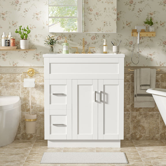 White bathroom vanity with sink and cabinet doors, plus drawer fronts with bar pulls