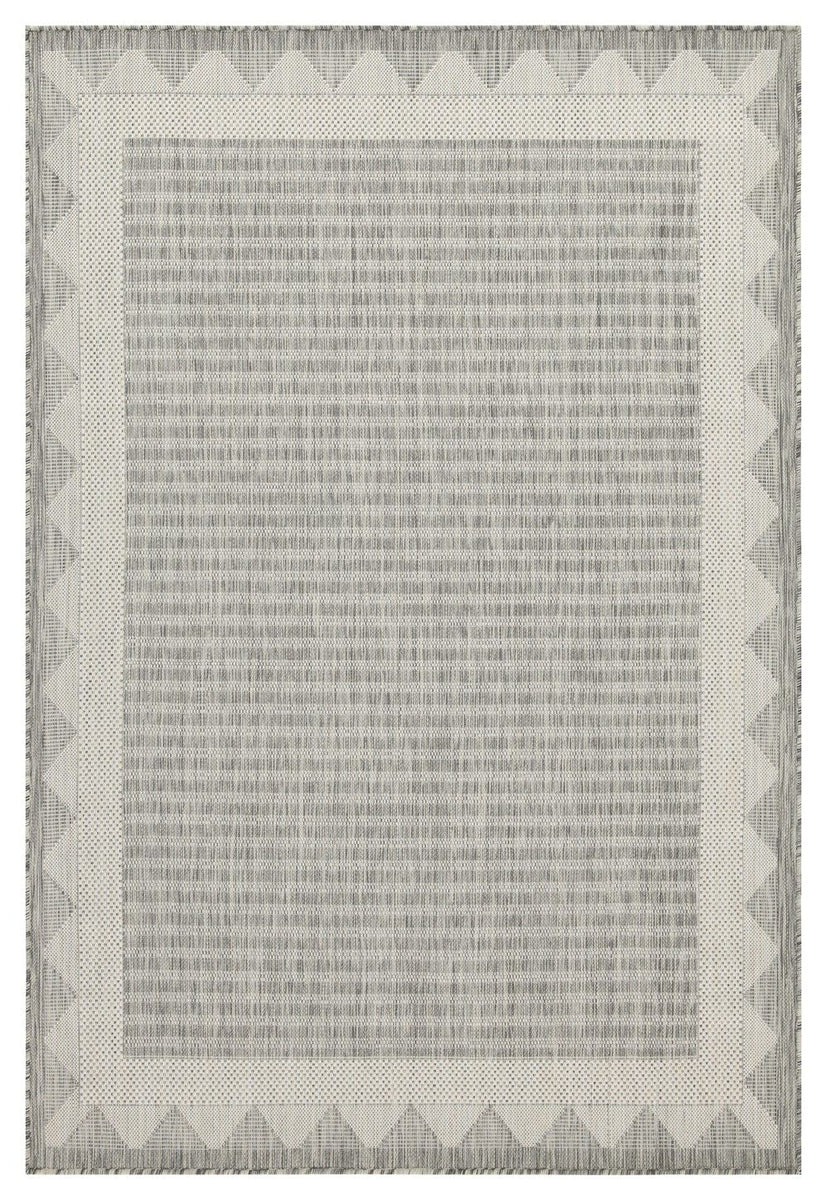 Silver-gray rug with central striped texture and zigzag border.