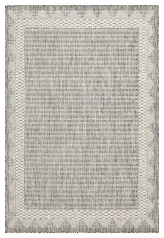 Light gray striped area rug with cream zigzag border and centered grid pattern