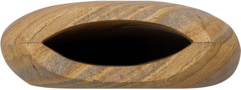 Sandstone vase with wide opening and dark interior in sand-beige stone.