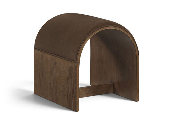 Dark brown velvet upholstered bench with arched back and warm wood base, open center