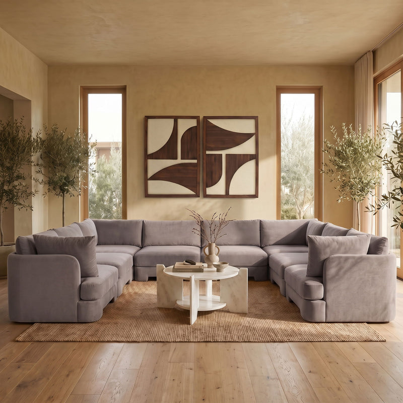 Gray velvet U-shaped sectional sofa with low arms and chaise corner sections
