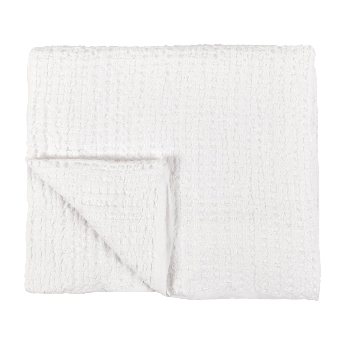 White quilt with textured woven surface and folded corner detail.