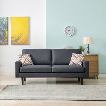 Dark gray 2-seat sofa with two zigzag patterned throw pillows and square arms