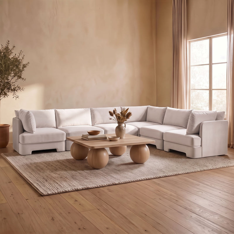 Light gray velvet corner sectional sofa with modular seats and squared arm cushions