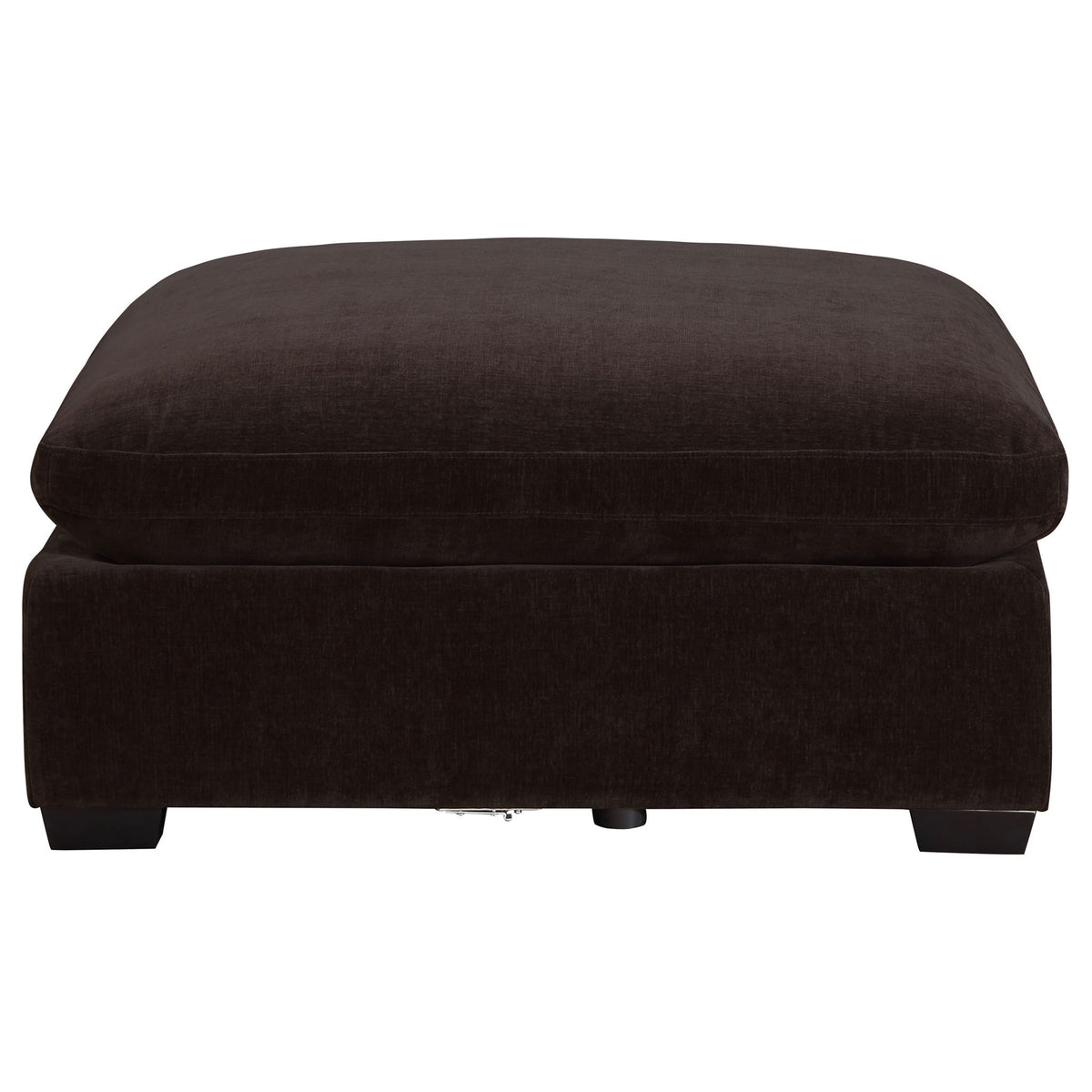Black upholstered ottoman with thick cushion top and short wooden legs.