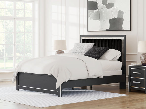 Upholstered panel bed with dark frame, upholstered headboard, and white bedding in a room scene.