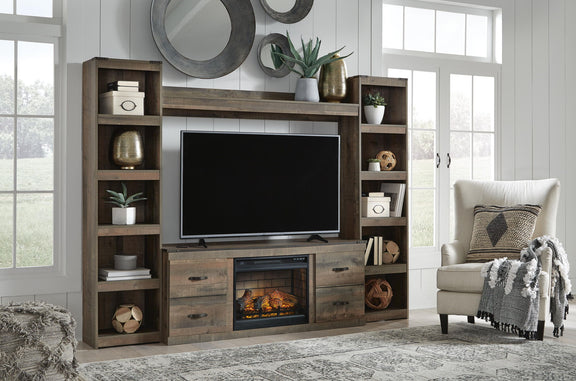 Dark brown entertainment center with TV opening, shelves, and fireplace insert