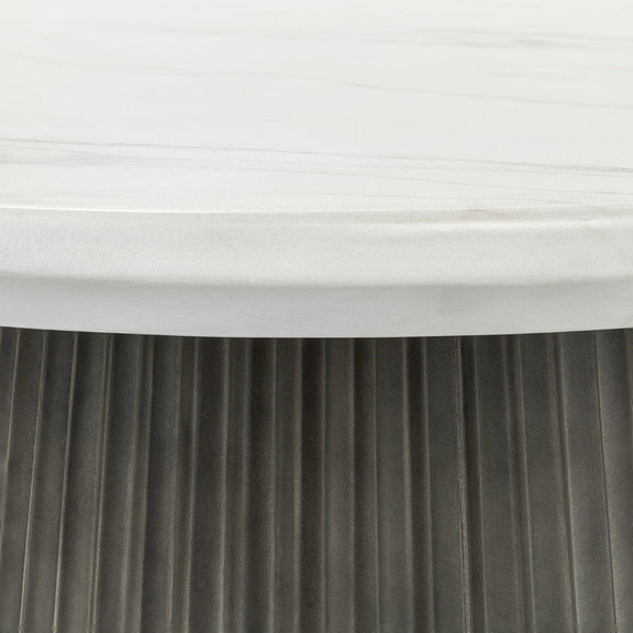 Outdoor round dining table side, dark ribbed pedestal base with light stone top