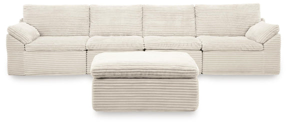 Ivory striped 4-piece sectional sofa with matching ottoman and rounded arms