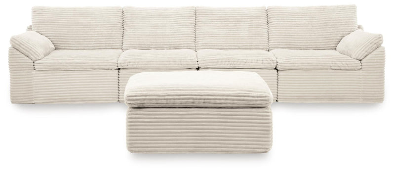Ivory striped 4-piece sectional sofa with matching ottoman and rounded arms