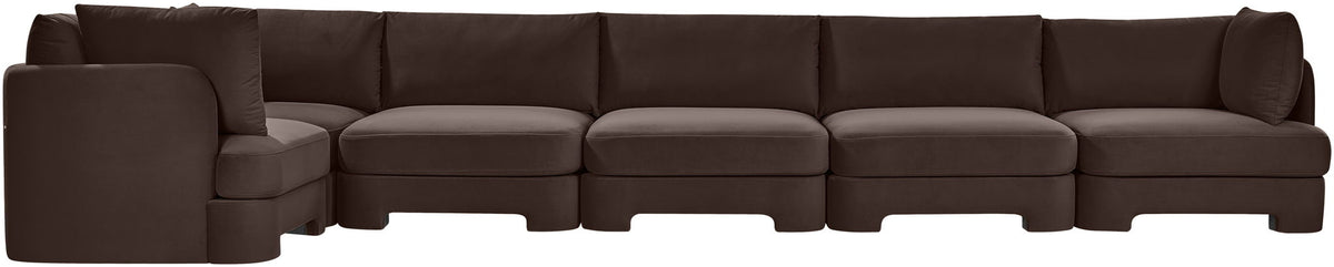 Dark brown velvet L-shaped sectional sofa with tufted back cushions and chaise-style seats.