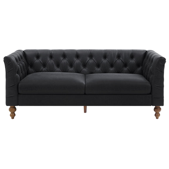 Black chesterfield-style sofa with tufted back, flared arms, and wooden legs