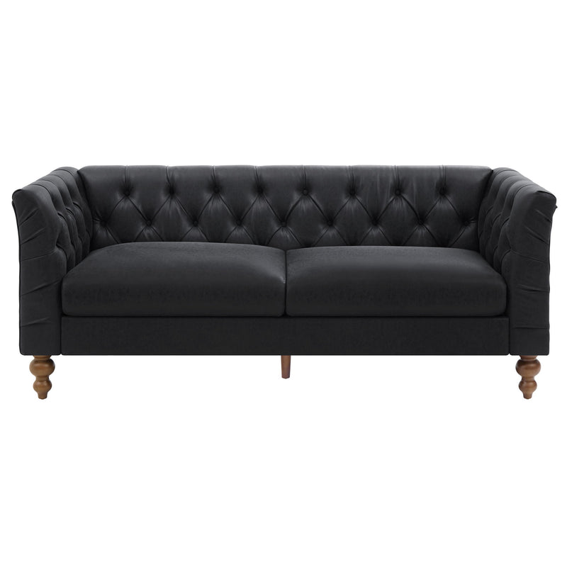 Black chesterfield-style sofa with tufted back, flared arms, and wooden legs