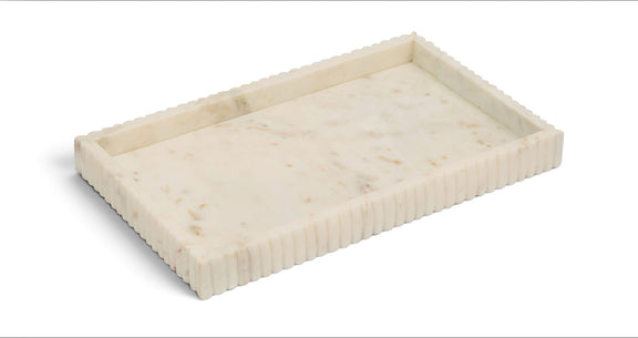 White marble tray with carved ridged border and faint speckling on the surface