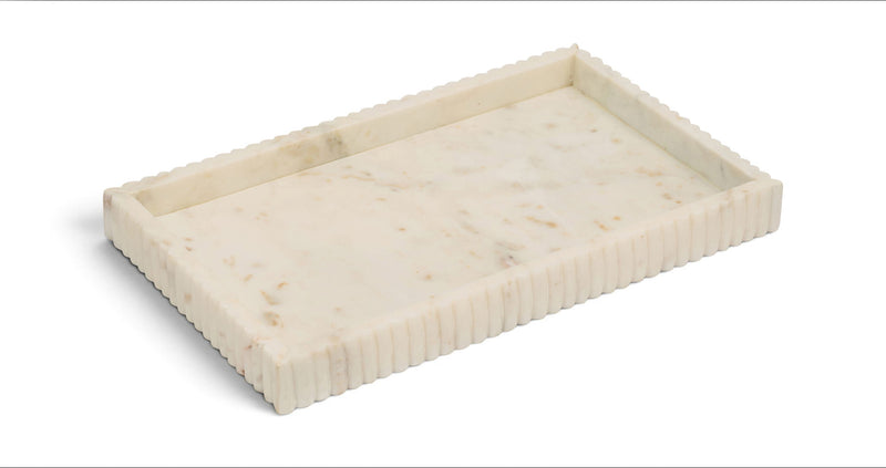 White marble tray with carved ridged border and faint speckling on the surface