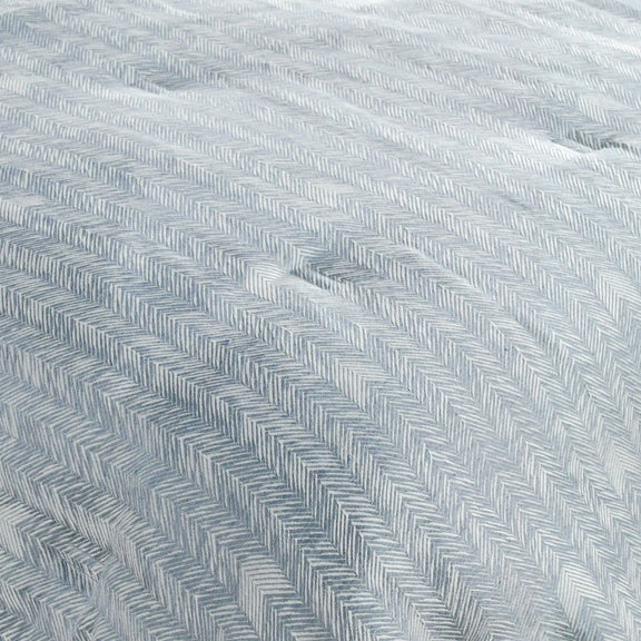 Storm blue herringbone fabric close-up with textured zigzag weave