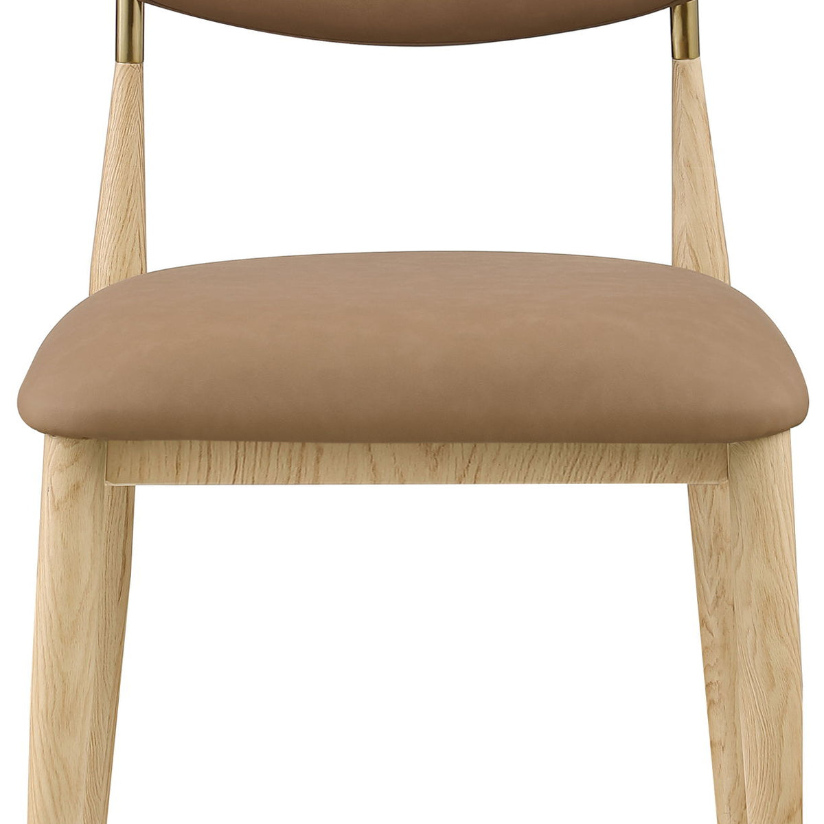 Tan upholstered dining side chair with light wood legs and brass accents