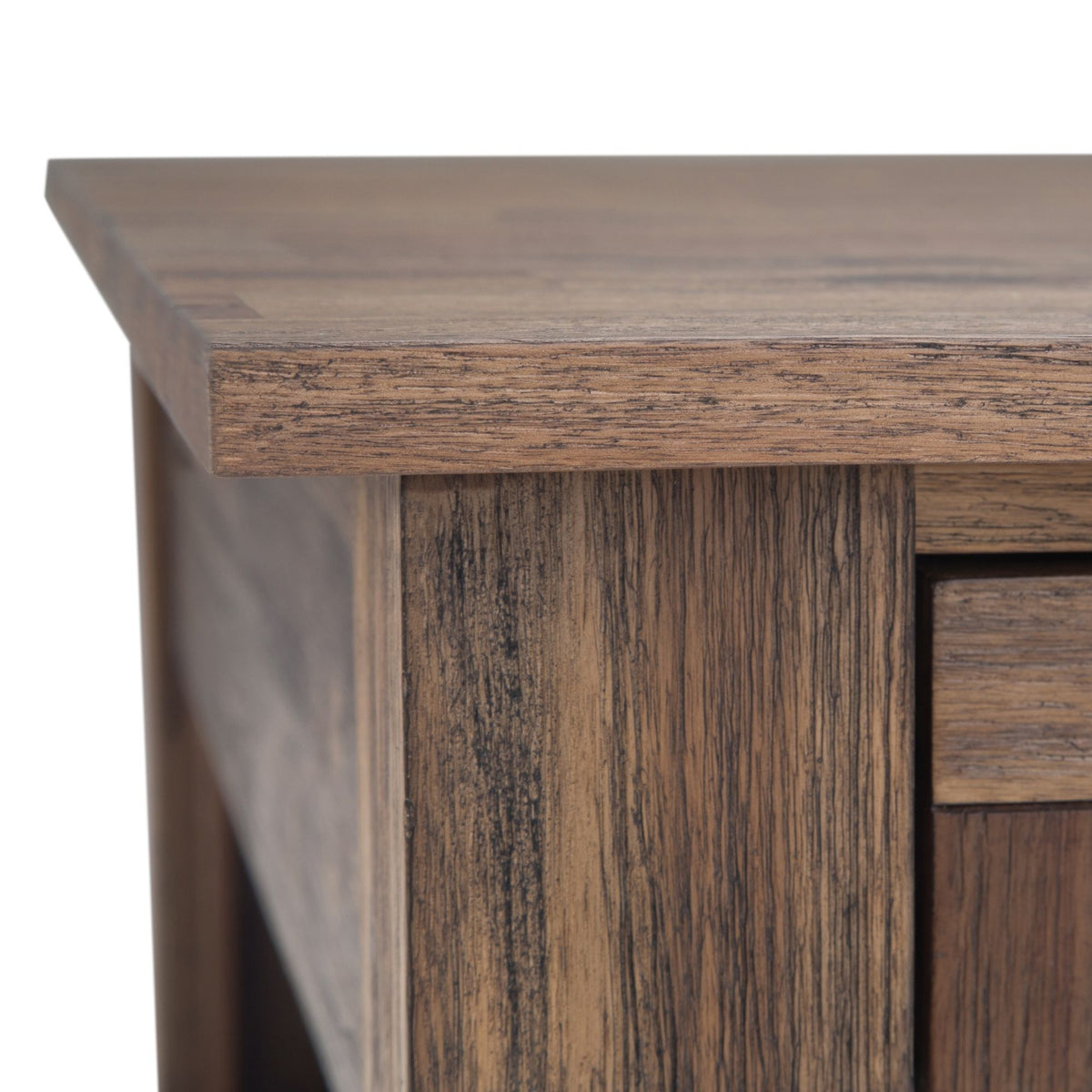 Close-up of wood grain on a dark side table drawer and cabinet frame