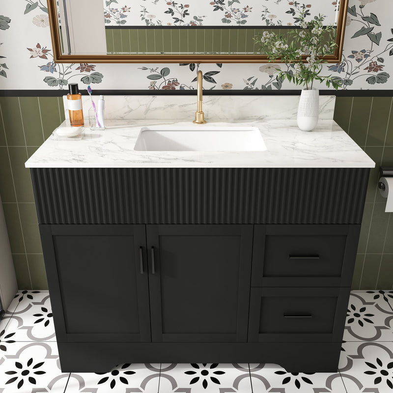 Black bathroom vanity with fluted front, sink countertop, and soft-close drawer units
