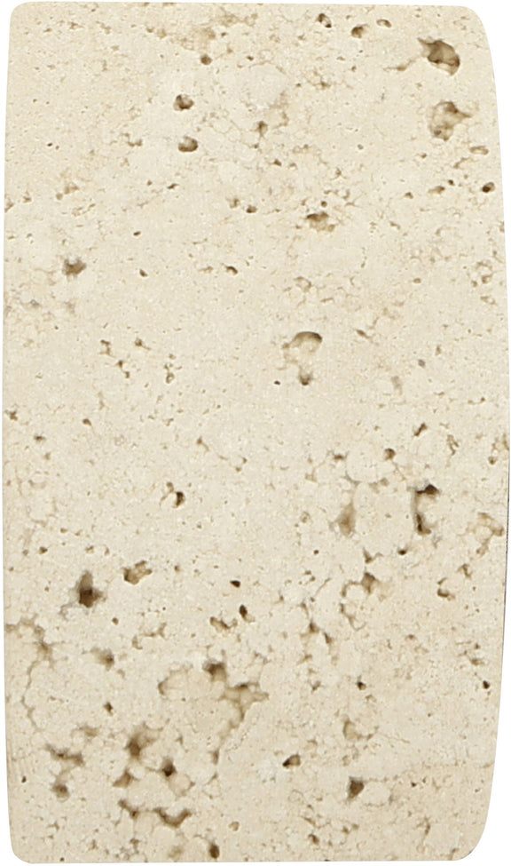 Beige travertine bookend close-up, speckled stone texture on solid back