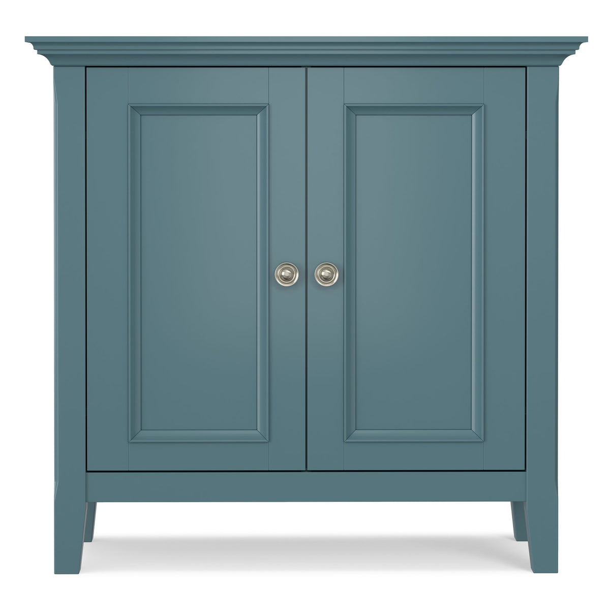 Blue low storage cabinet with two paneled doors and round metal knob pulls