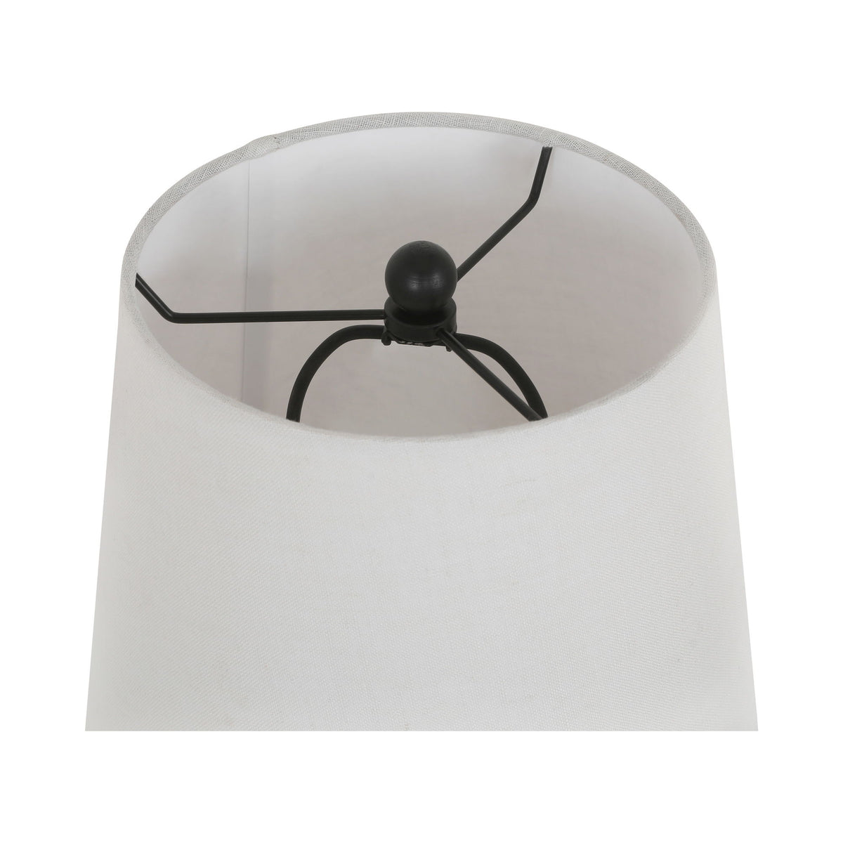 White fabric table lamp shade with black finial and metal arms