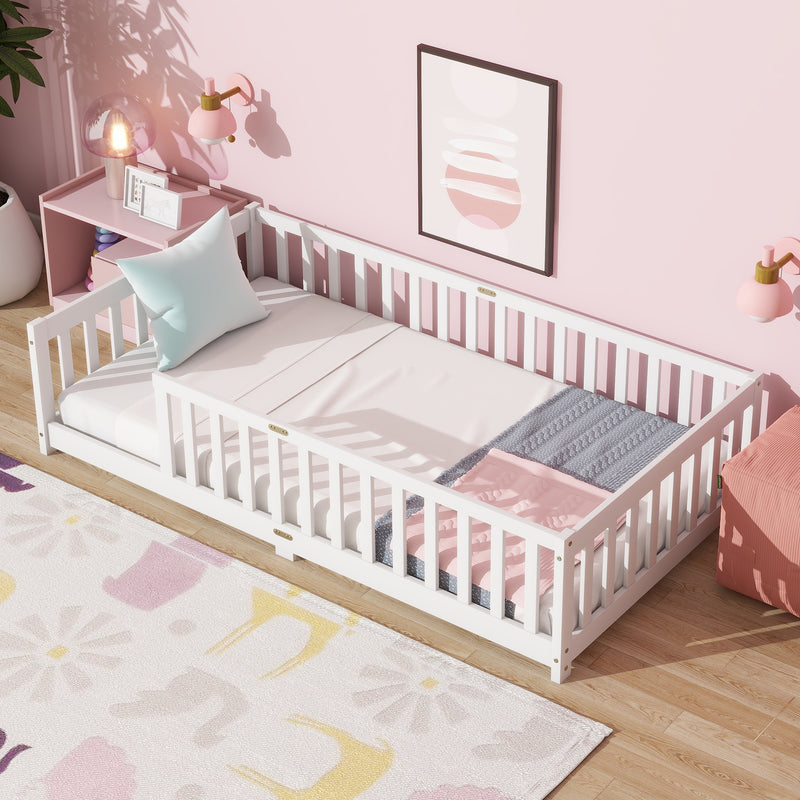 Twin-size white floor bed with safety guardrails and fence, without door, slatted frame