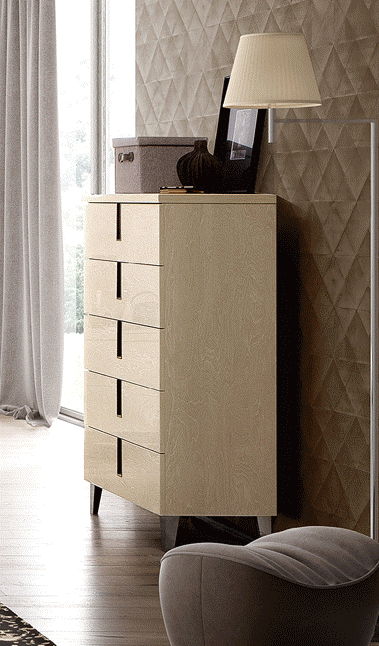 Beige 5-drawer chest with rectangular bar pulls and tapered legs