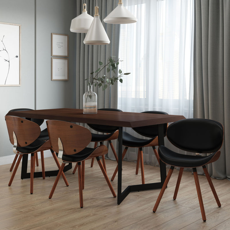 Black faux leather dining chair with curved back, seat, and arched wooden legs