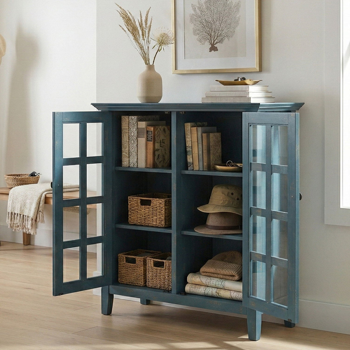 Blue medium storage cabinet with open glass-pane doors and cubby storage