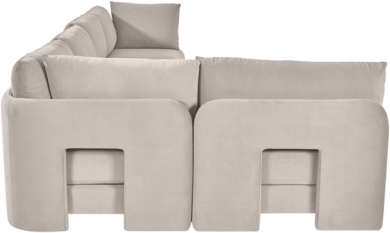 Light gray velvet sectional sofa with chaise and two cushioned arm panels