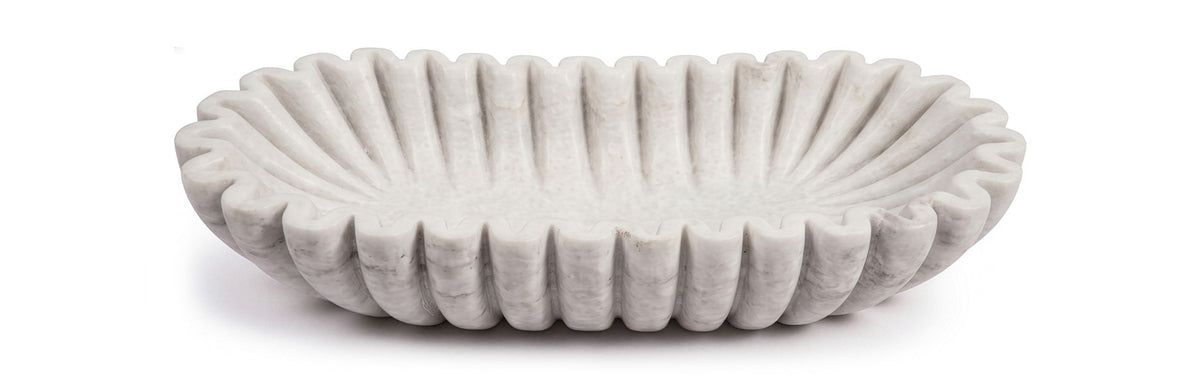 Decorative round bowl with vertical ribbed texture, light gray finish.