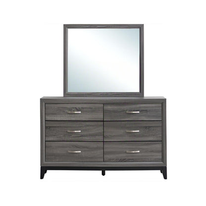 Dark gray dresser with six drawers and a square framed mirror