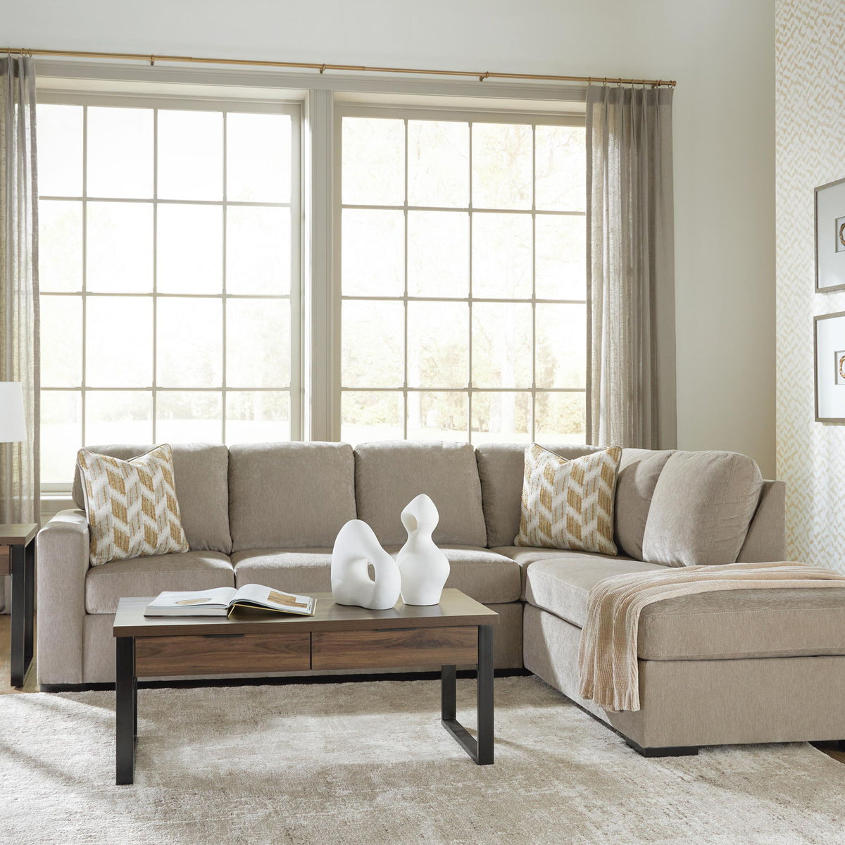 Bridgepoint sectional sofa with chaise, light gray upholstery, patterned accent pillows