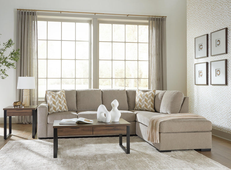 Bridgepoint sectional sofa with chaise, light gray upholstery, patterned accent pillows