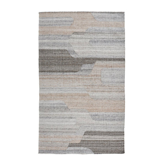 Sand, gray, and charcoal indoor/outdoor rug with abstract angular blocks and texture