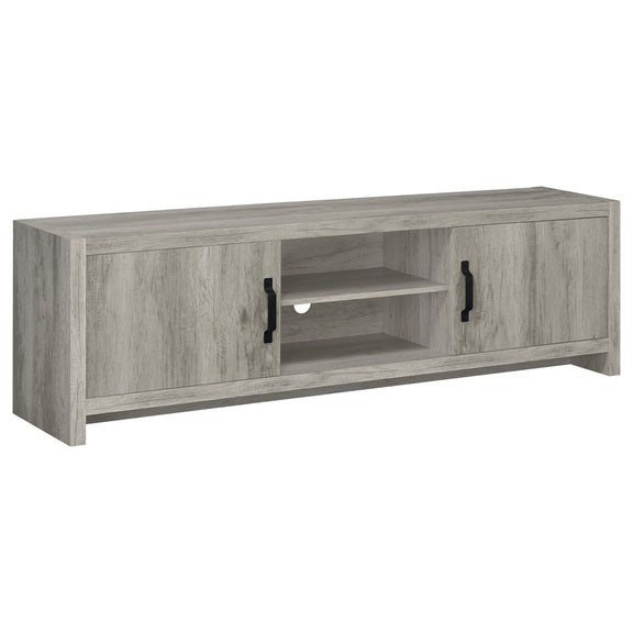 Gray TV stand with two open shelves and adjustable interior compartments