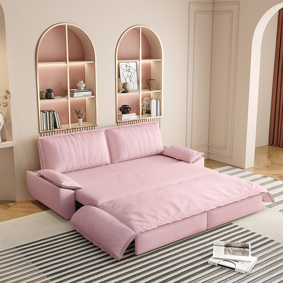 Pink sleeper sofa bed with pull-out mattress and two folded side bolsters